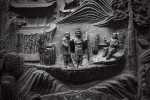 Sculture di pietra sulle mura della Residenza della Famiglia Wang